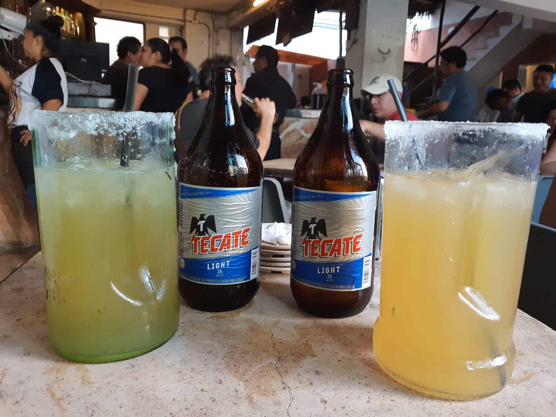 Enjoying a couple of Chelada beers at a Merida bar